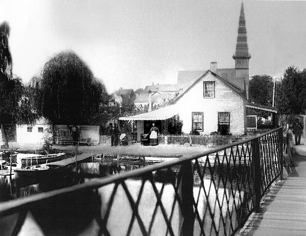View across Broadkill from the bridge, looking north on Union Street, 1905 or earlier